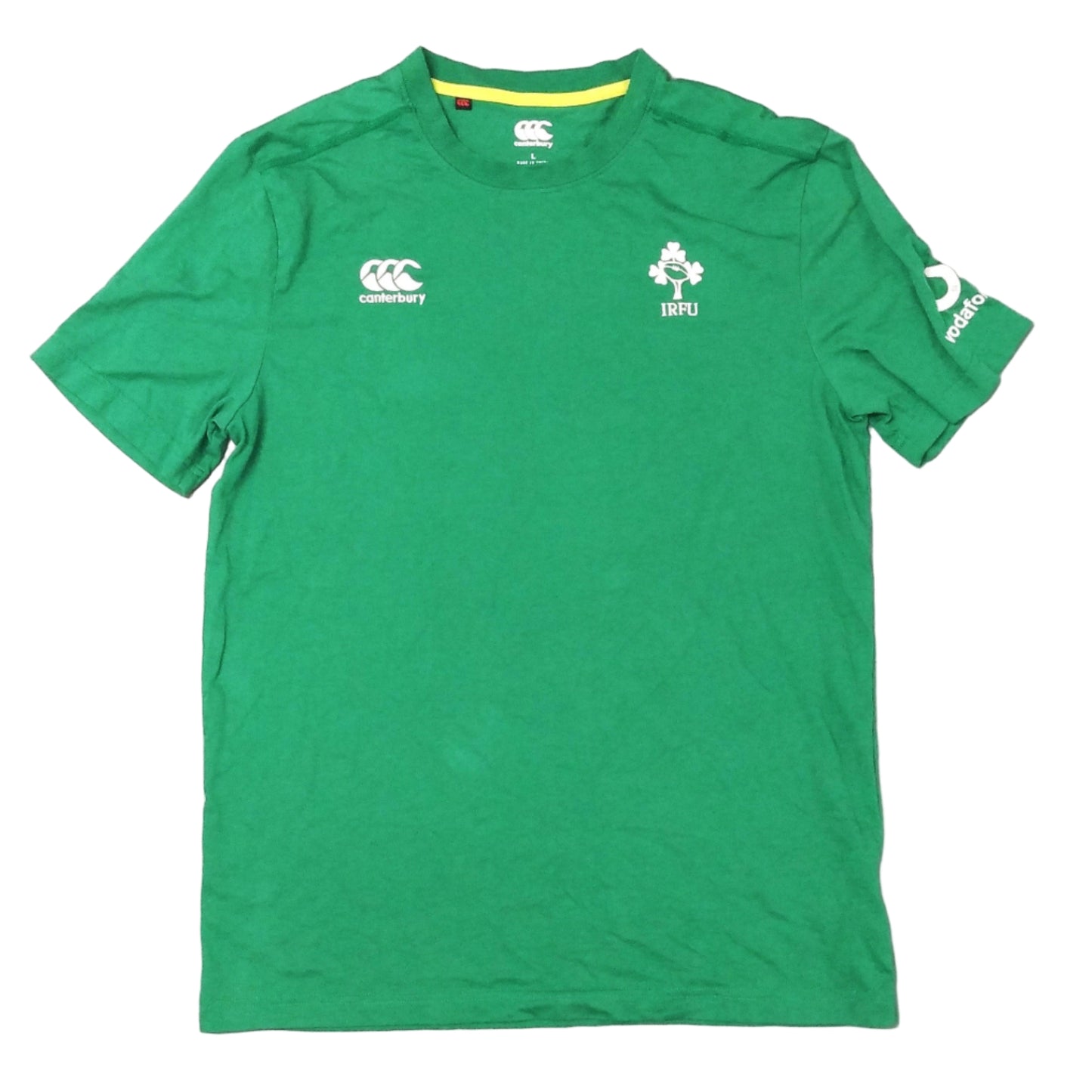 A green Canterbury rugby t-shirt with the Irish national team emblem, laid flat on a plain surface.