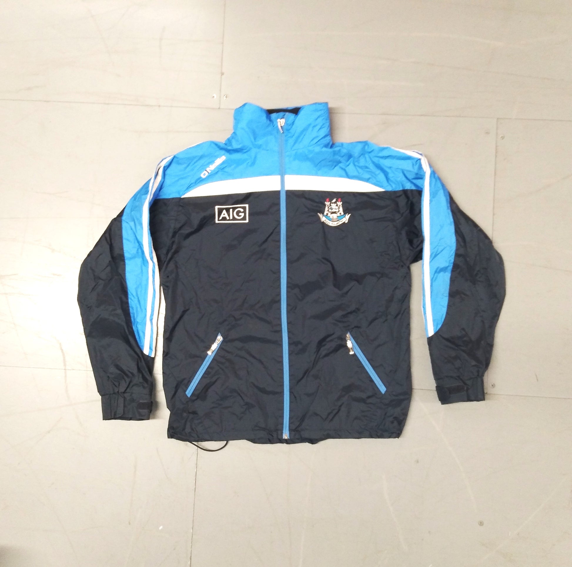  Dublin GAA  Long Sleeve  Training  Jacket  2014 / 15  O'Neills     Unisex Adults       AIG  SHIRTS V SKINS    Dublin GAA  Long Sleeve  Training  Jacket  2014 / 15  O'Neills     Unisex Adults       AIG  SHIRTS V SKINS  