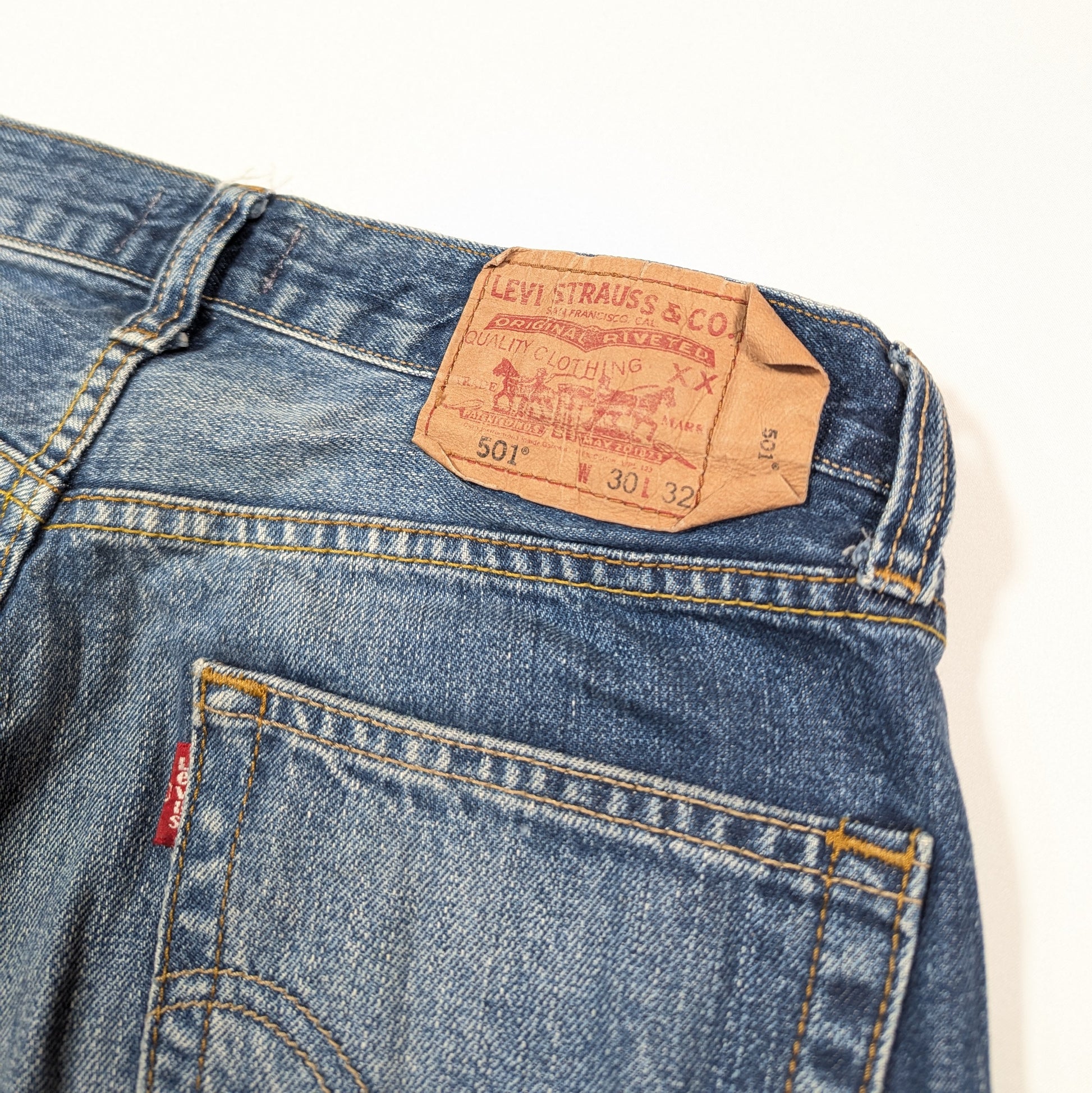 Close-up of a Levi's jeans label on a white background